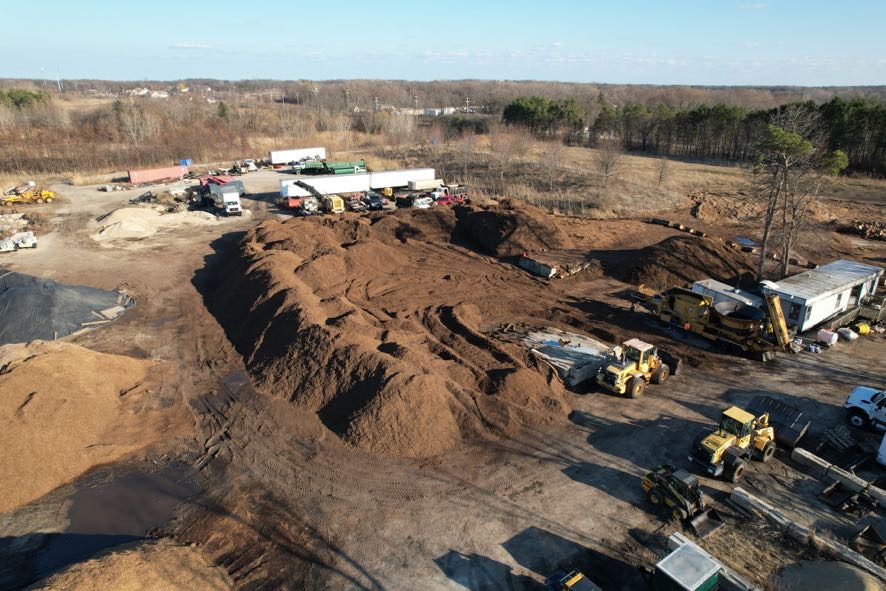 Premium dark mulch stockpile ready for delivery Lake County IL